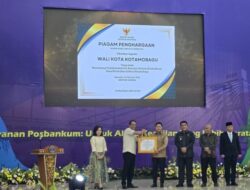 Wakil Wali Kota Kotamobagu Raih Penghargaan Saat Hadiri Peresmian 1.839 Posbakum se-Sulut, Kotamobagu 
